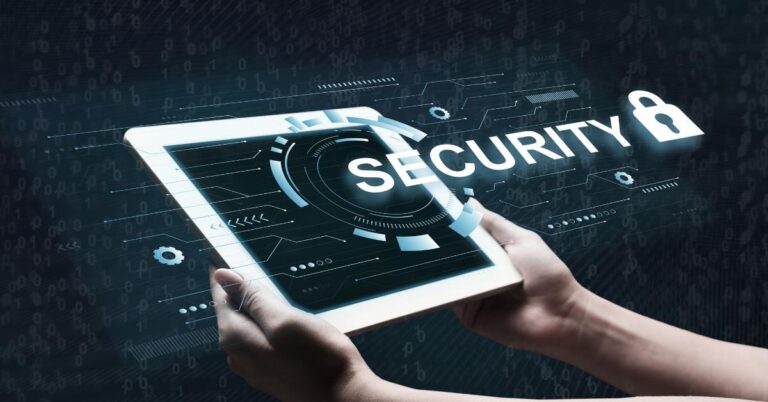 Hands holding a tablet displaying a security concept, emphasizing digital safety and protection.